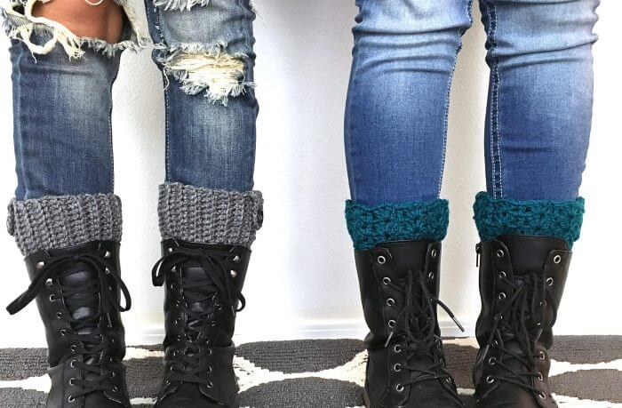 Photo of 2 persons wearing black boots and crocheted warmers