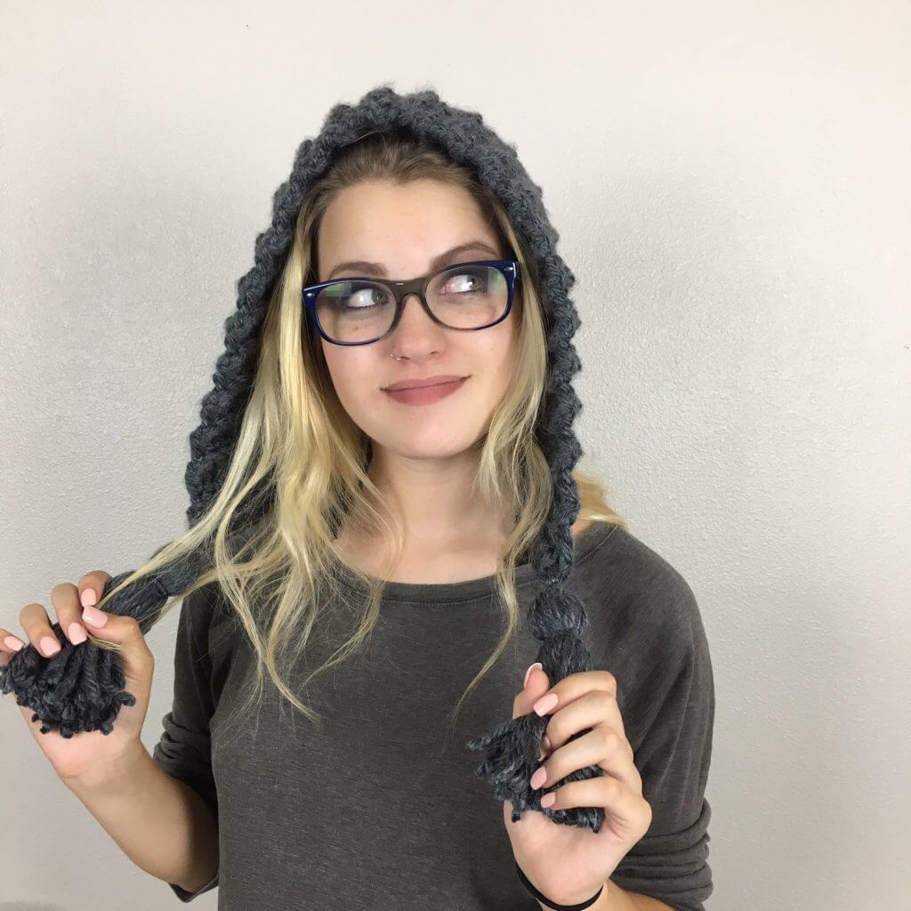 CHELSEA EARFLAP HAT CROCHET PATTERN | Mysterious and Modern, Cute and Couture, whatever your fashion ideals, this hat is perfect for you! It's loose fit prevents hat-head and the tassel embellisment scream, "I've got style!" This pattern whips up in less than an hour and is perfect for both beginner and expert crocheter alike.