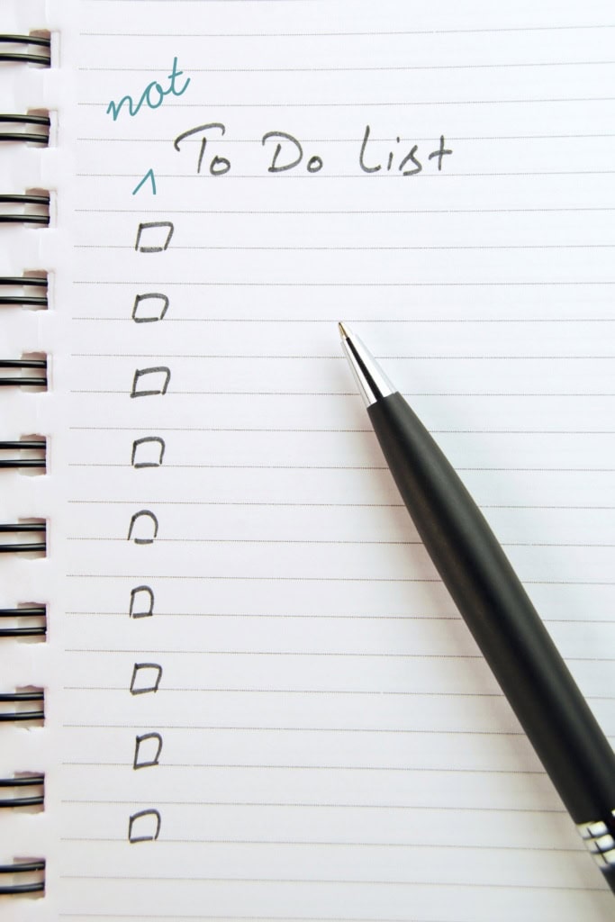 Boost Productivity - image of a spiral notebook with a column of checkboxes under the words "To Do List," which is annotated to add the word "not"