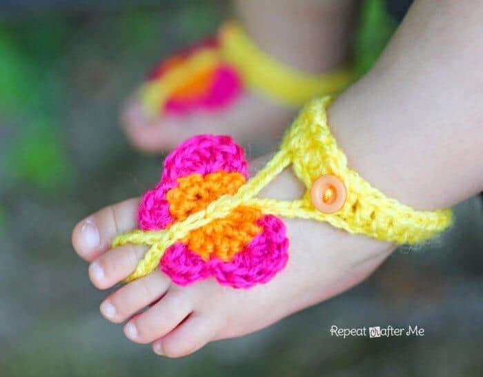 Closeup photo of the Butterfly Baby Sandals worn by an infant