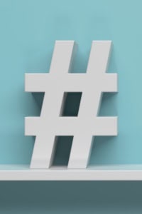hashtags for crochet - image of a 3D wooden hashtag character