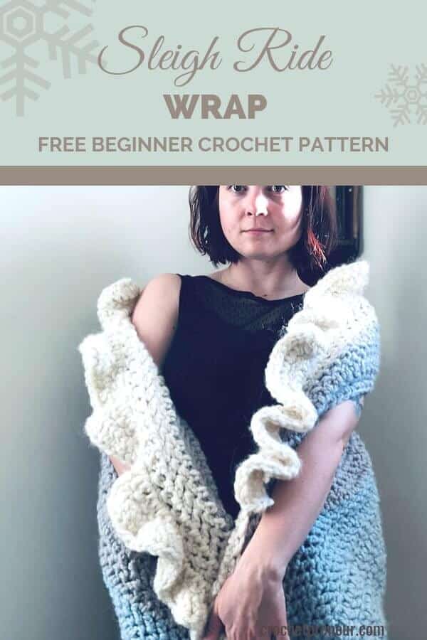 Falling snow, jingling bells, and moonlit strolls - this beautiful Sleigh Ride Wrap crochet pattern brings us back to quieter times when slowing down and savoring the moment came easily. Now, you can return to those times, too, when you create this wrap, put it on your shoulders, and breathe in the holidays with your favorite cuppa joe. #hyggeholiday #cozychristmas #freecrochetpattern #freewrappattern #crochetwrappattern #30daysofcozy