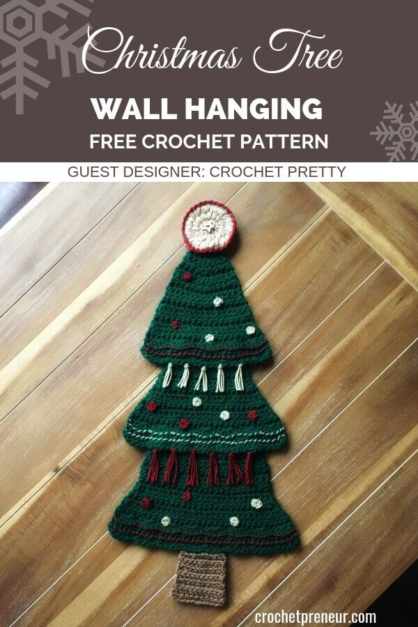 Add some rustic interest to your holiday decor with this Evergreen Christmas Tree Wall Hanging Crochet Pattern. Tassels and garland really make this motif the star of your holiday decor. Get the pattern for free! #christmastreewallhanging #wallhangingcrochetpattern #freecrochetpattern #crochetforchristmas