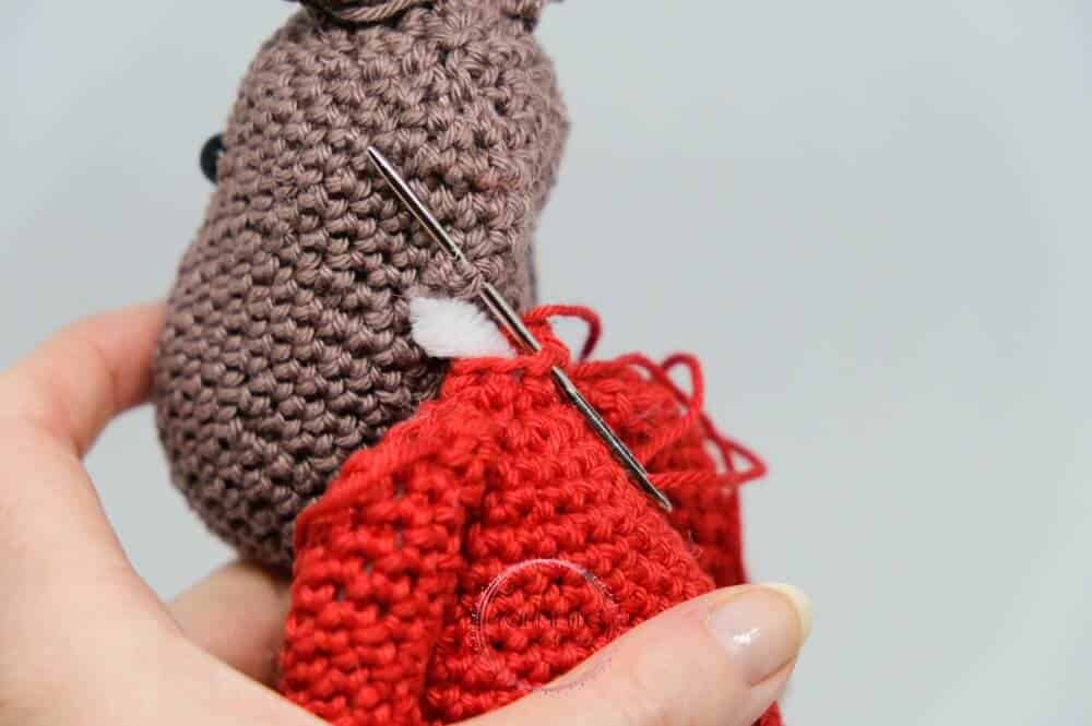 Instructional image while assembling the Einar Christmas Elk FREE Amigurumi Crochet Pattern