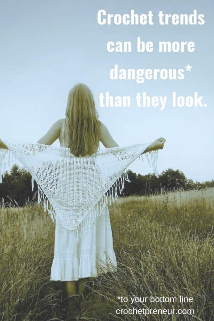 Pinterest image of a woman in a field wearing a white crochet shawl