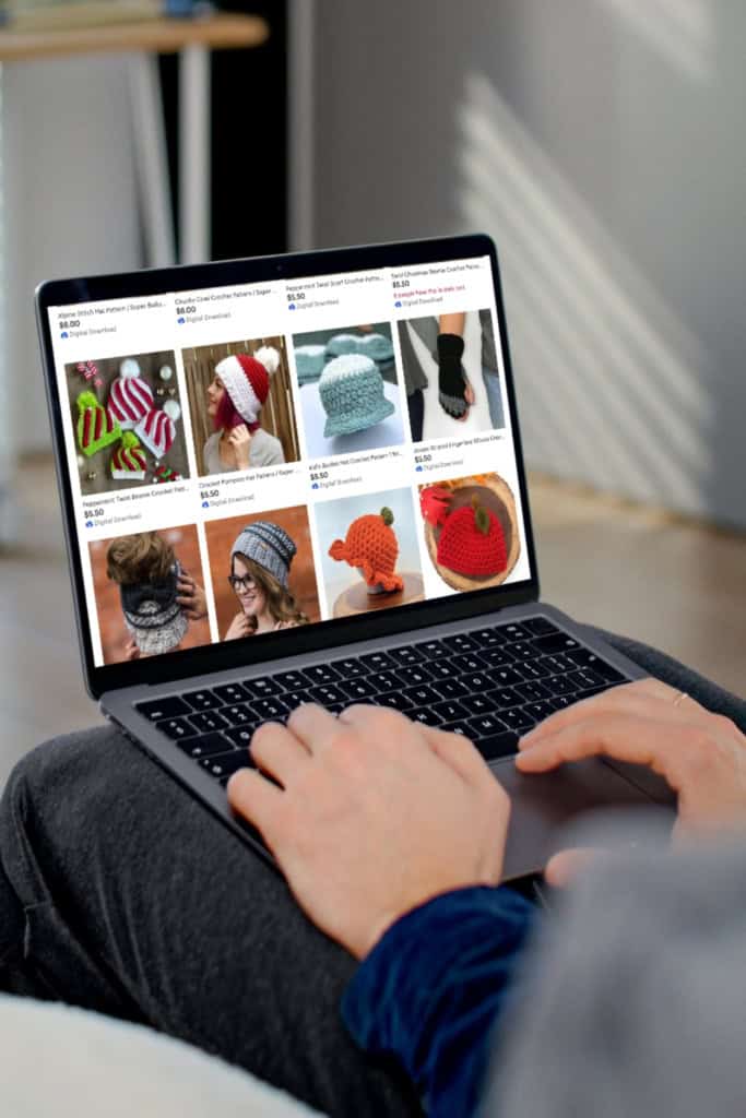 marketing-patterns-on-etsy - image of hands on a laptop keyboard. on the screen is a the Made with a Twist Etsy shop.