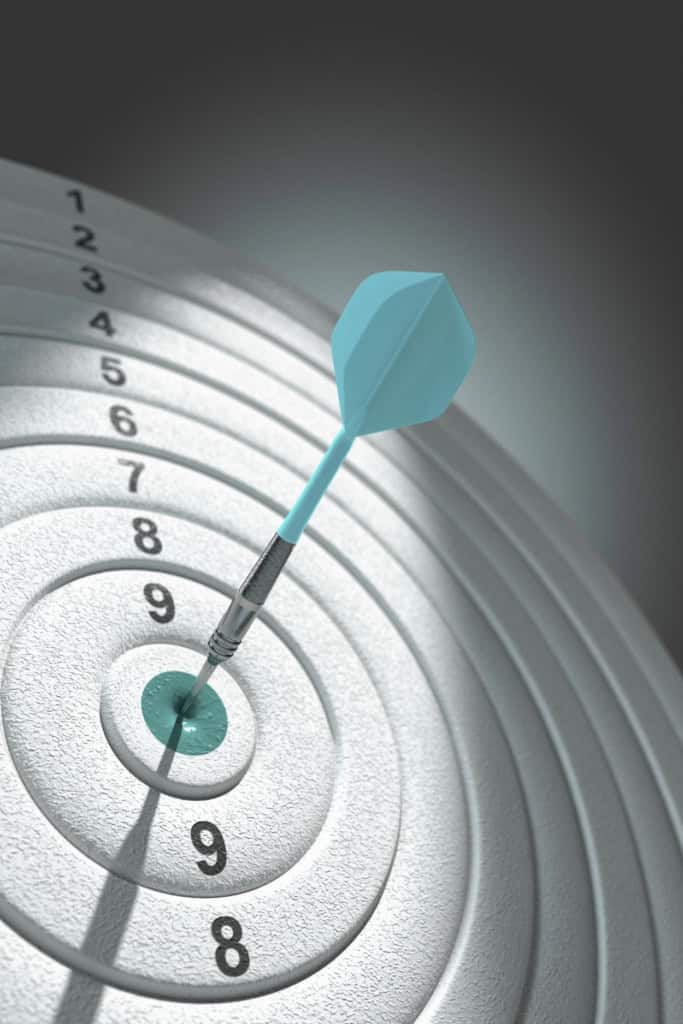 handmade business during a recession - dart board with a dart directly in the bullseye