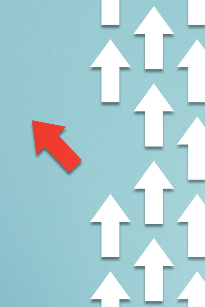 changes crochet business chat - image of many white arrows pointing in one direction and a red arrow diverging from the rest